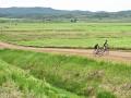 Biking enthusiasts enjoy the rural landscape on dirt roads during the annual Moots Colorado Ranch Rally, Image by Joel Reichenberger